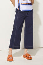 womens wide leg pant in ink with white topstitching worn by model