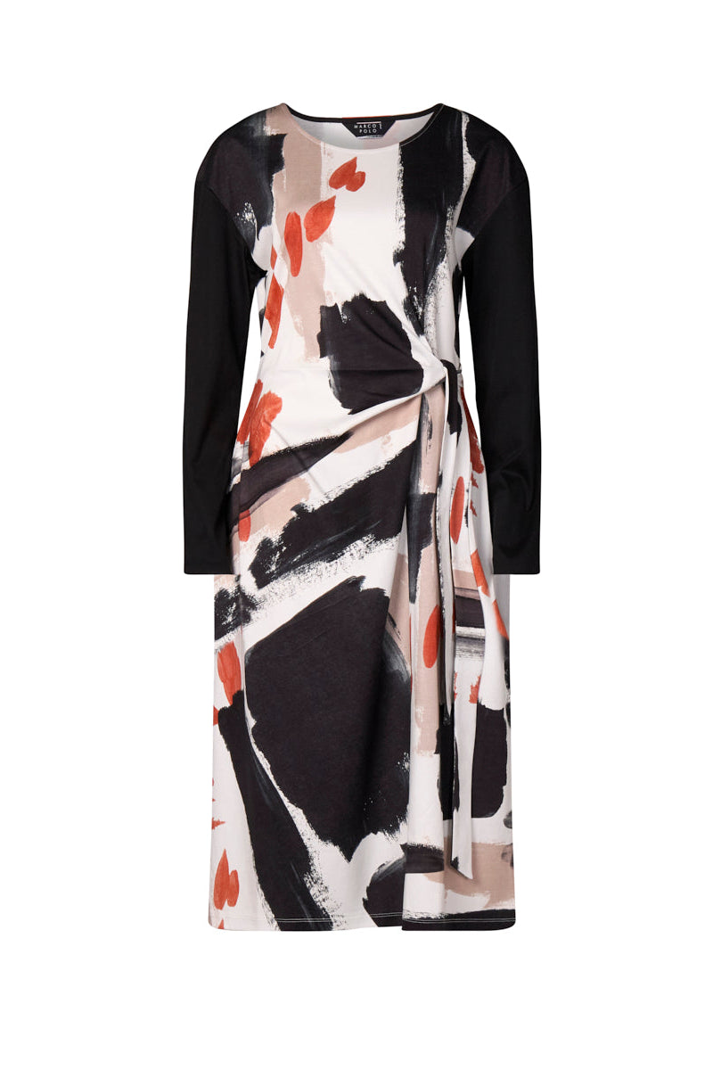 Long-sleeve dress with abstract pattern on a white background