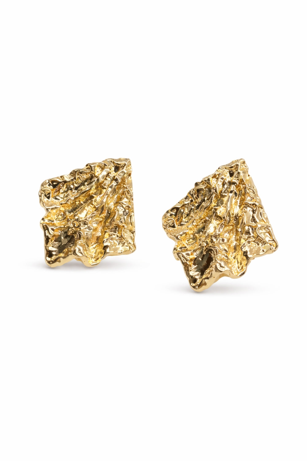 Pair of gold earrings on a white background