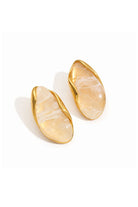 A pair of gold-toned oval stud earrings with smooth, organic-shaped cream and white marbled inlay, shown on a clean white background.