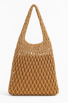 Brown woven handbag on a white background