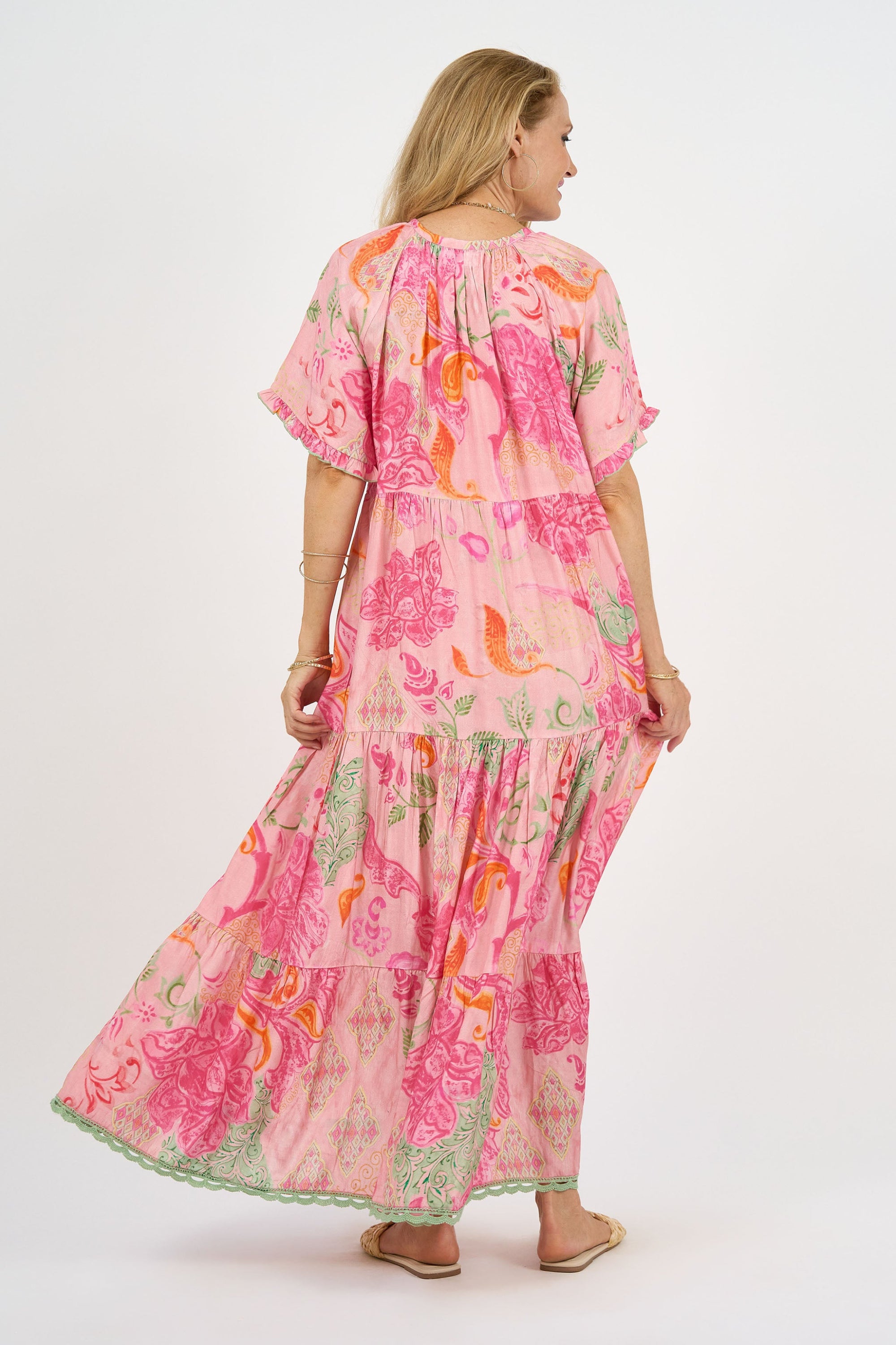 womens maxi dress boho pink floral worn by model back view
