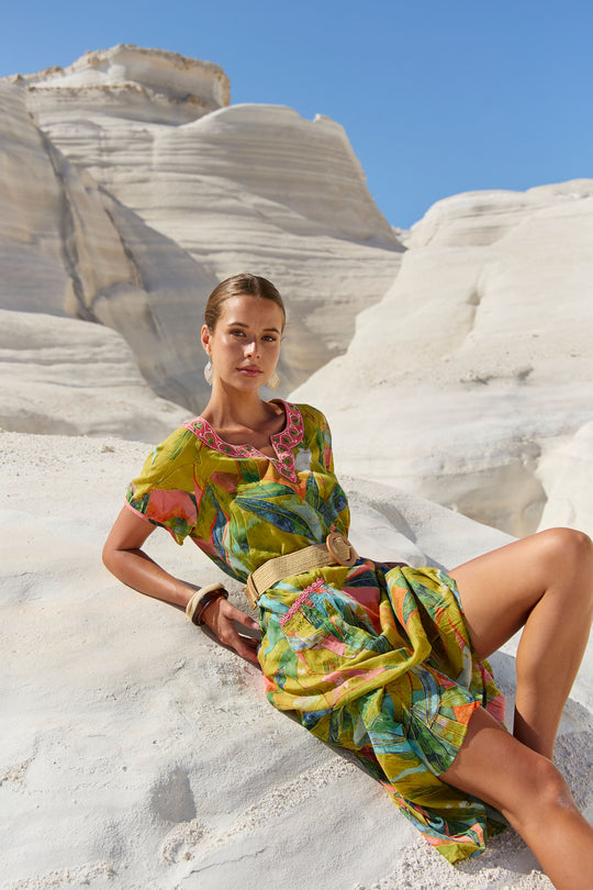 womens green multi leaf print midi dress worn by model outdoor campaign