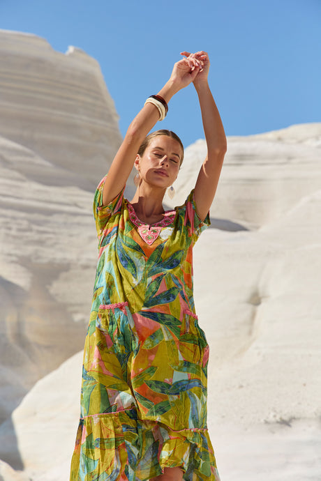 womens green multi leaf print midi dress worn by model outdoor campaign