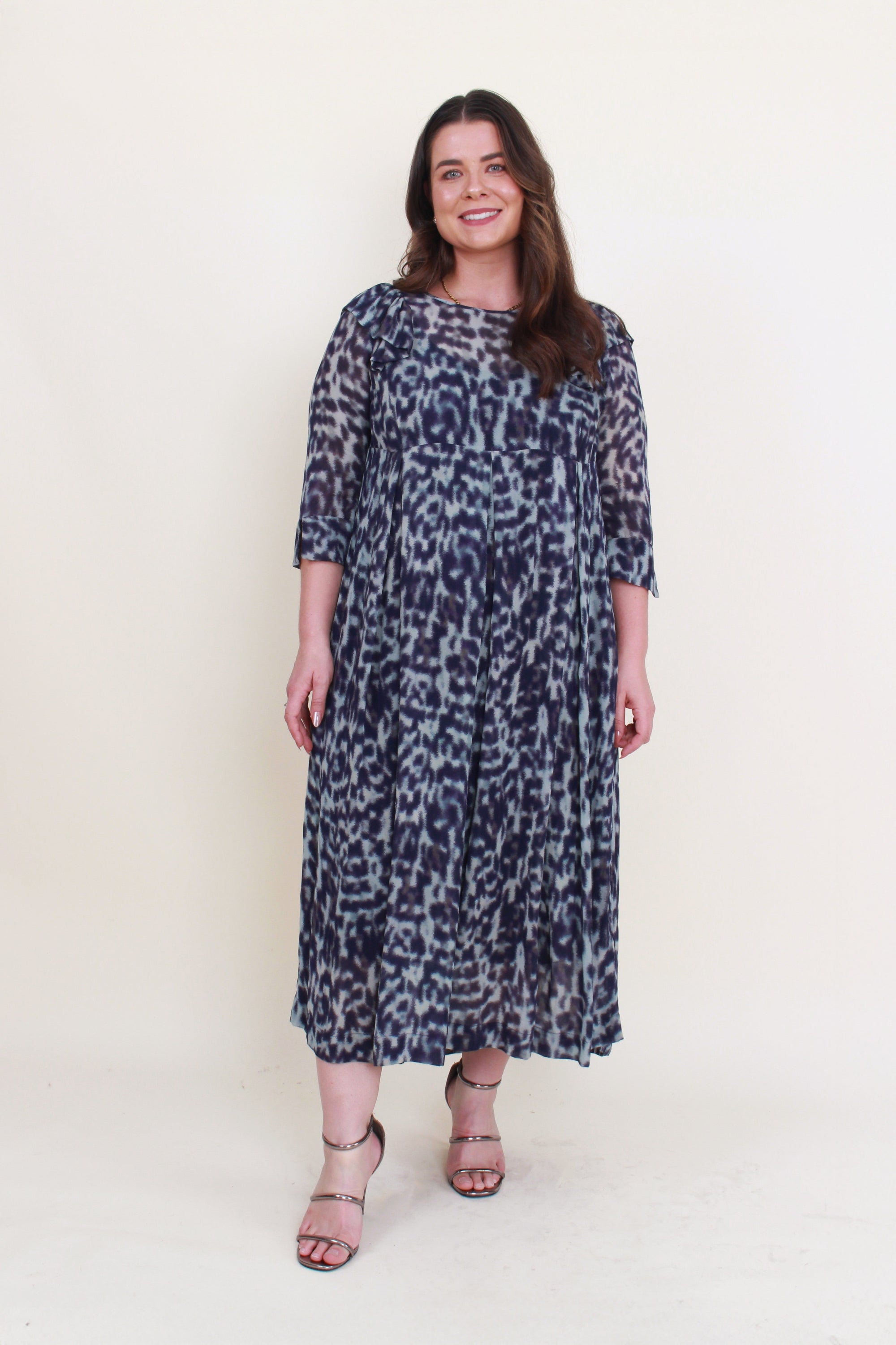 womens midi dress with pleats and half sleeve in blue jungle print worn by model 