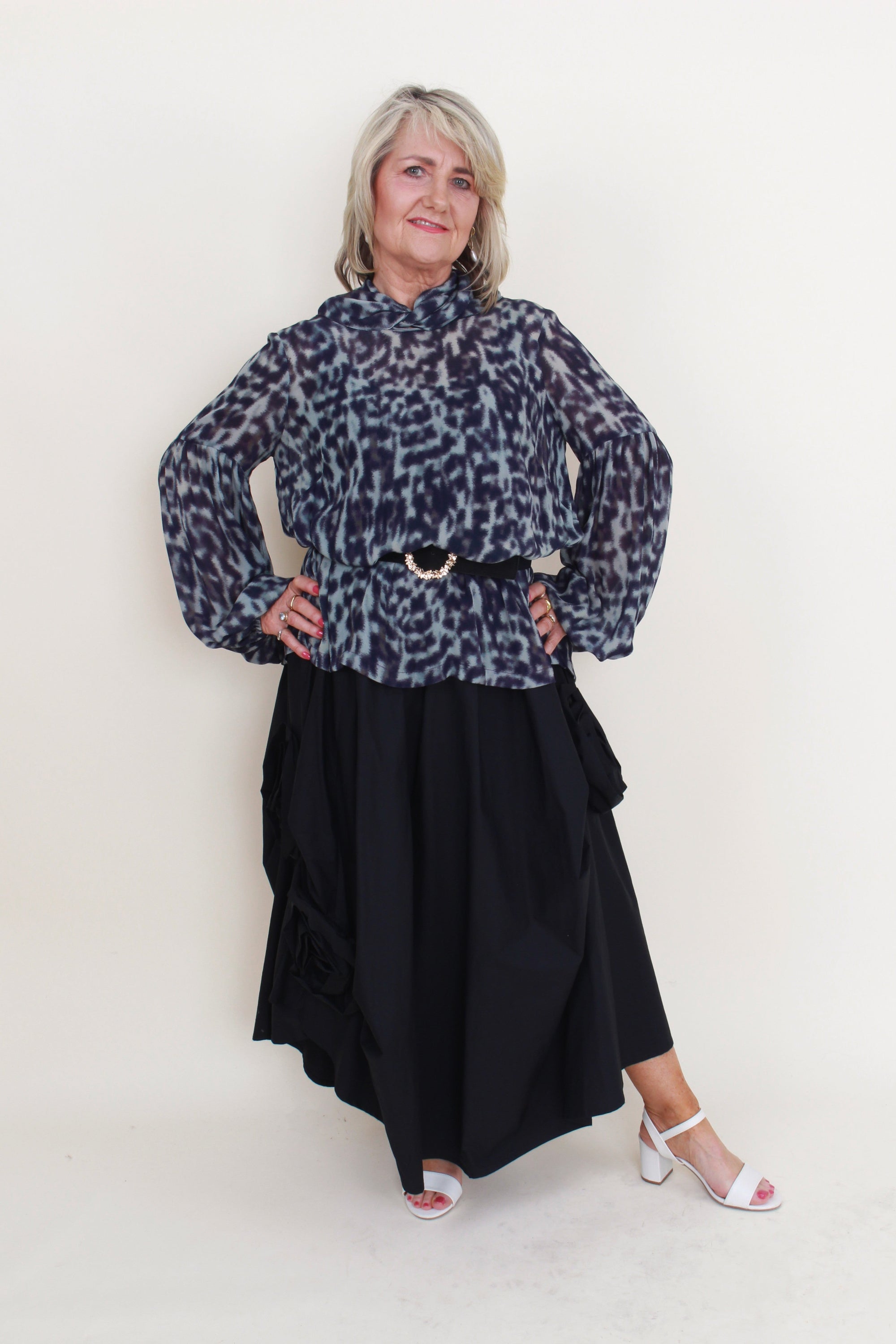 womens blouse long sleeve semi sheer in jungle blue worn by model 