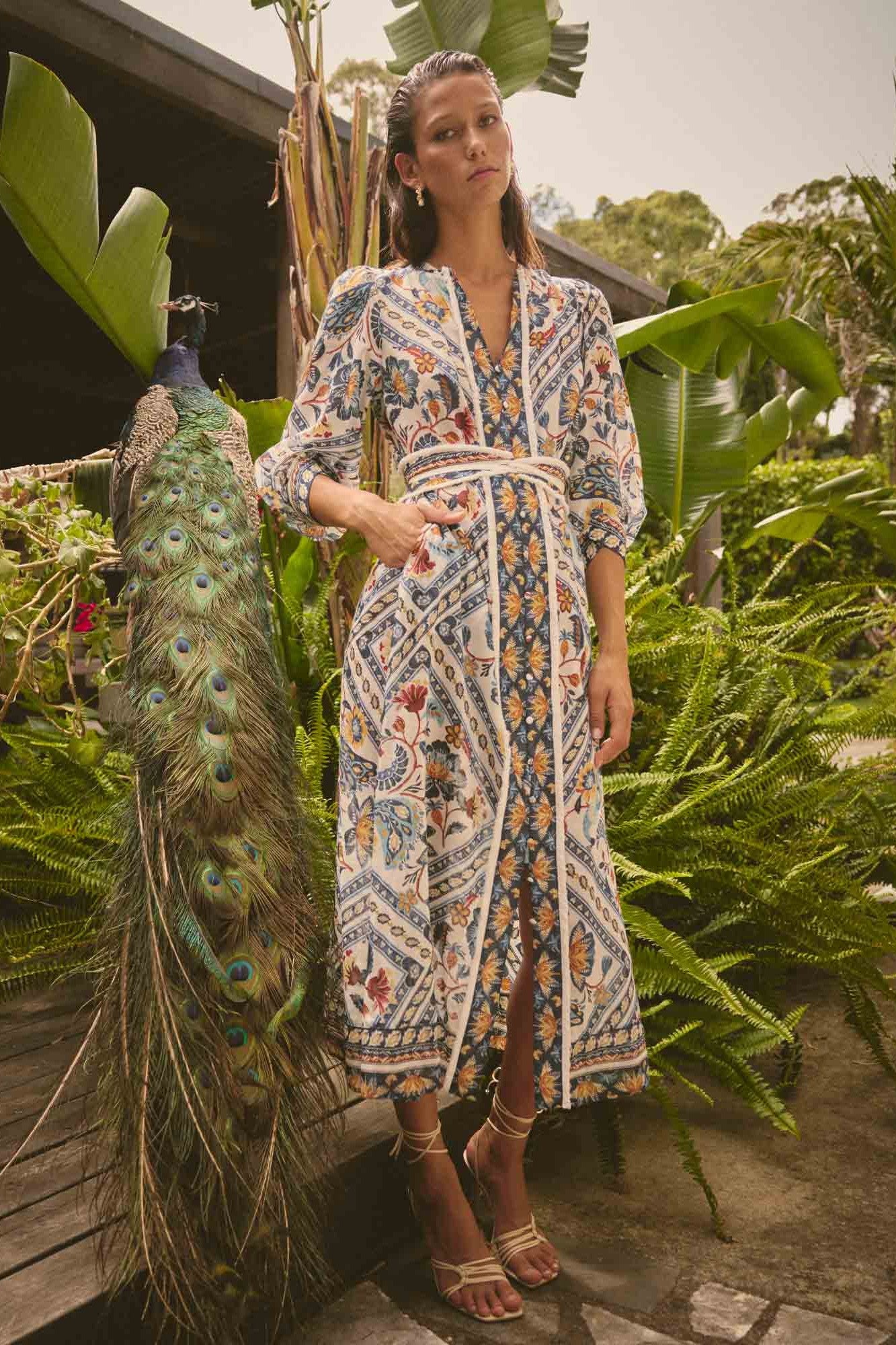 artisinal mutli colour print midi dress worn by model campaign