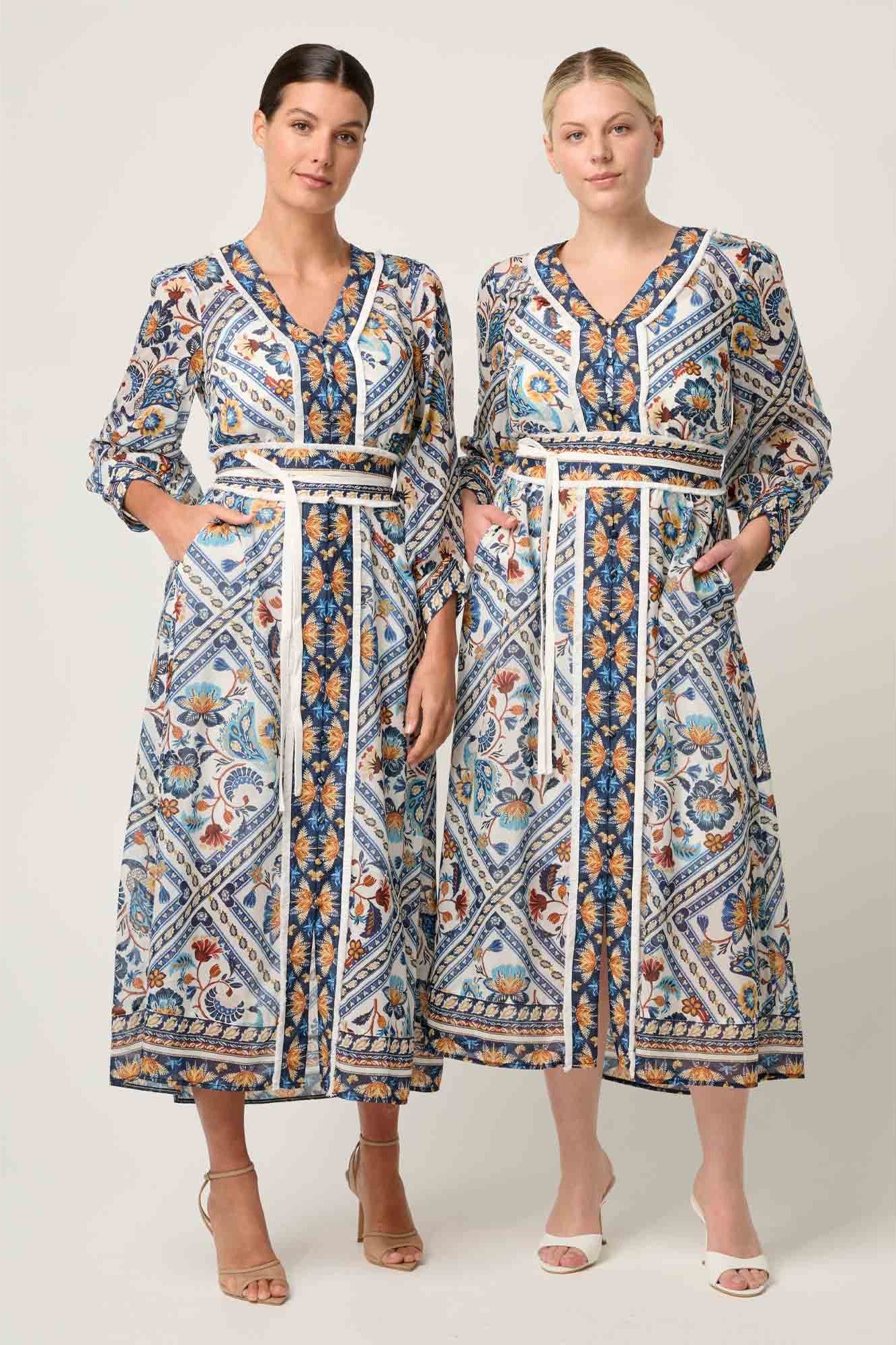 artisinal mutli colour print midi dress worn by two models