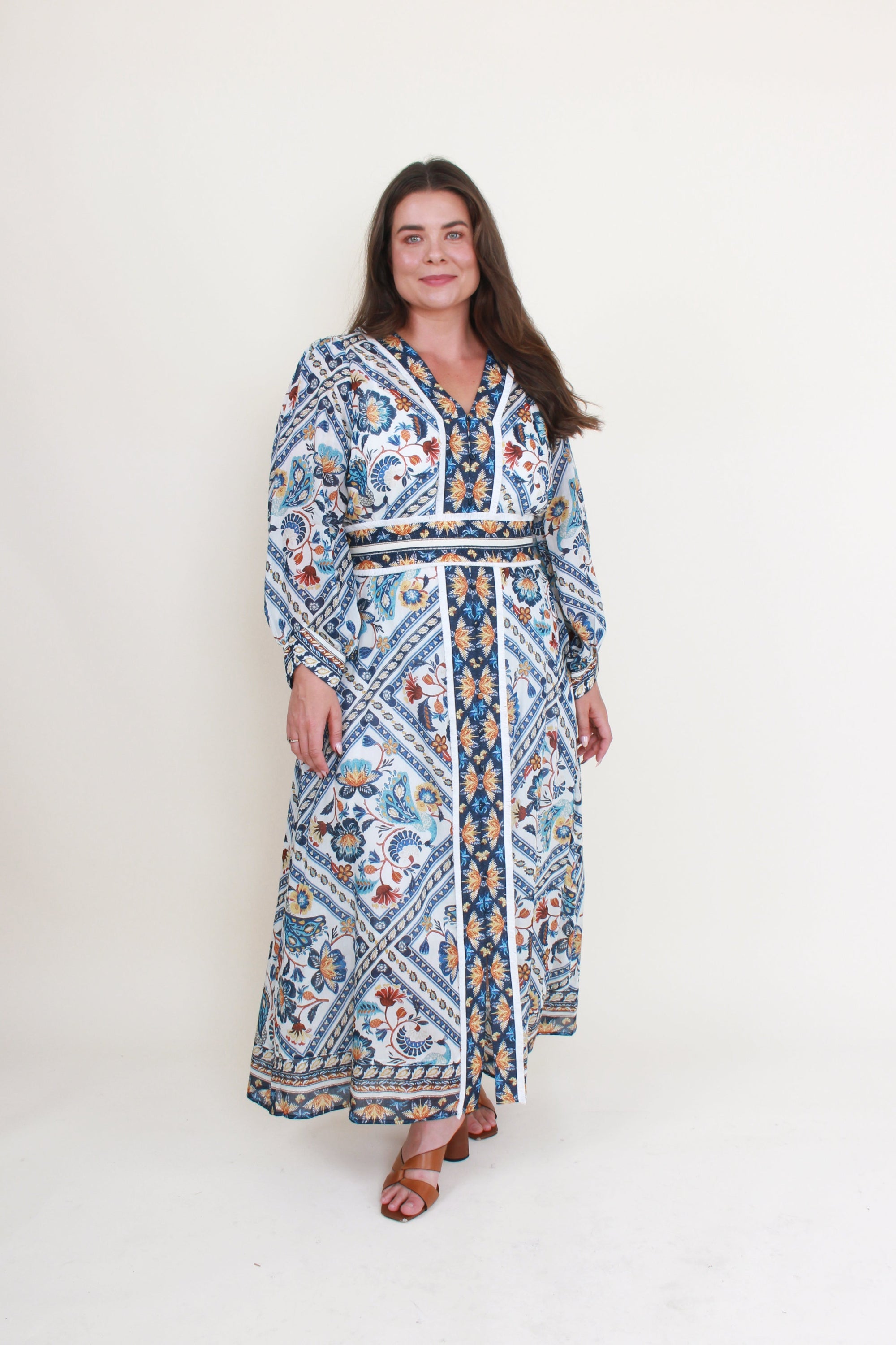 artisinal mutli colour print midi dress worn by model 