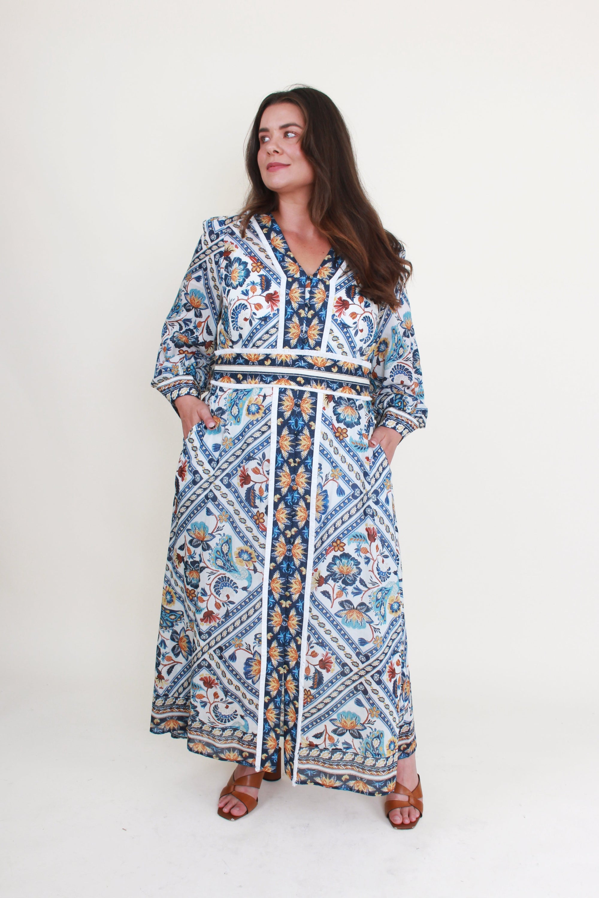 artisinal mutli colour print midi dress worn by model 