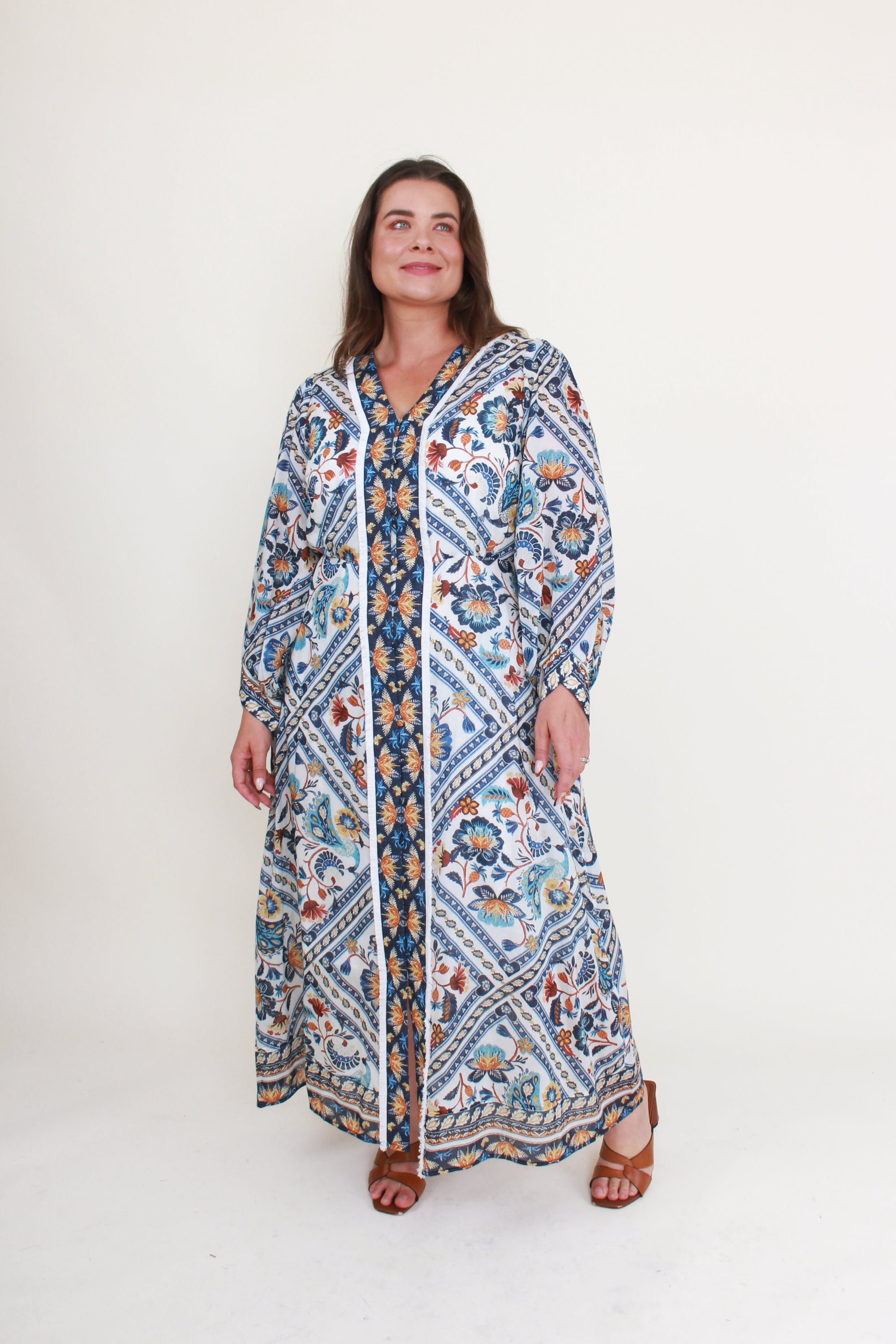artisinal mutli colour print midi dress worn by model 