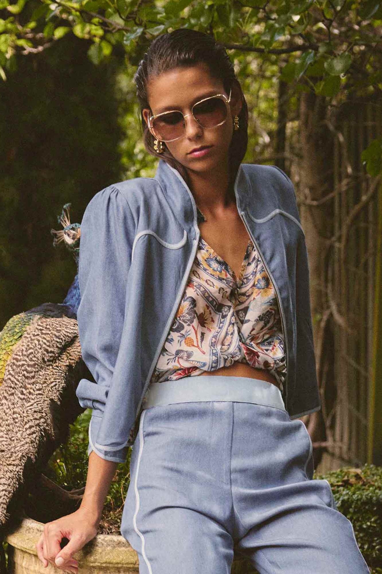 womens blue reversible jacket worn by model 