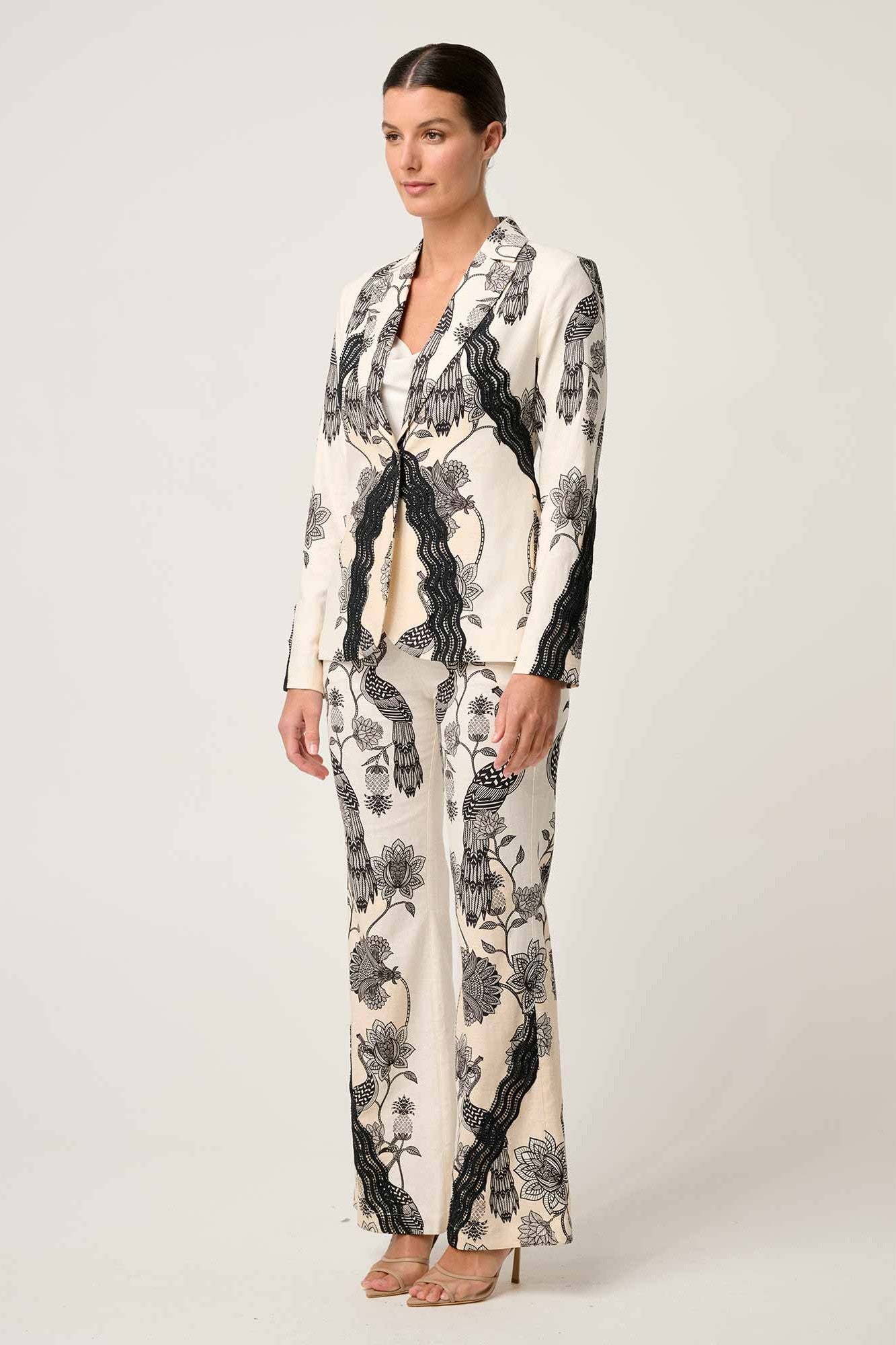 womens cream with black linework print blazer and pant worn by model side view