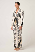 womens cream with black linework print blazer and pant worn by model side view