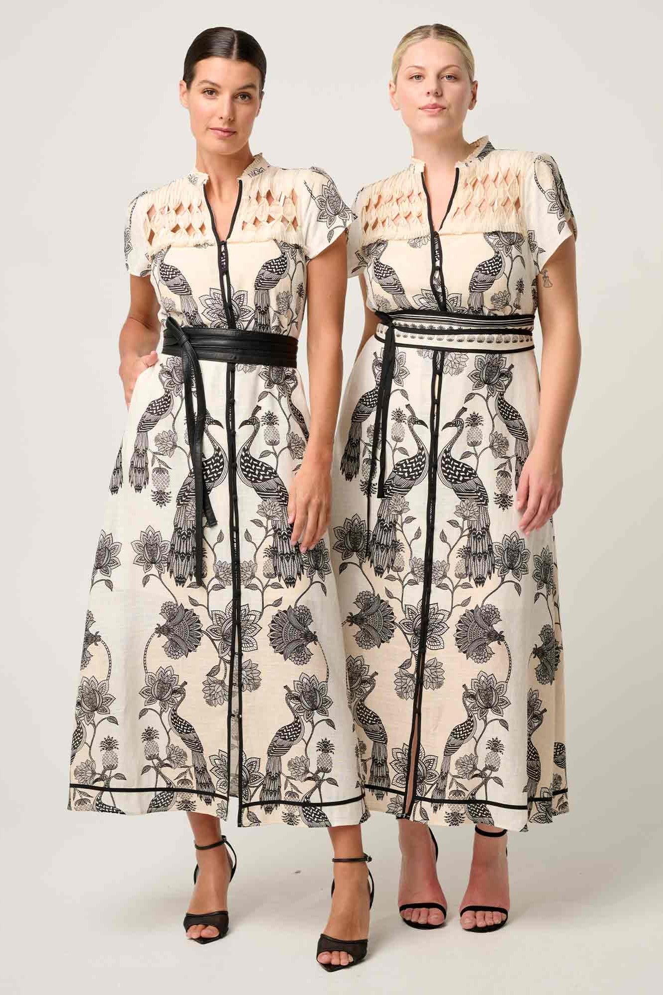 maxi dress cream with black linework worn by models