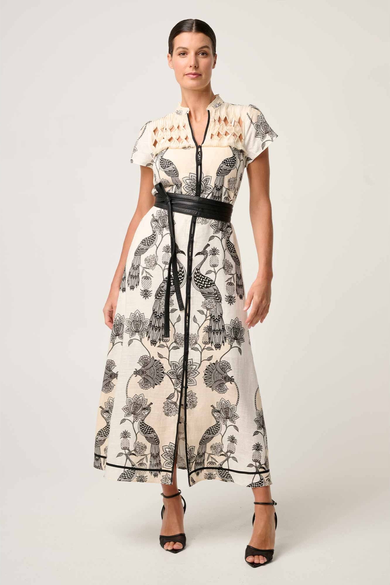 maxi dress cream with black linework worn by model 