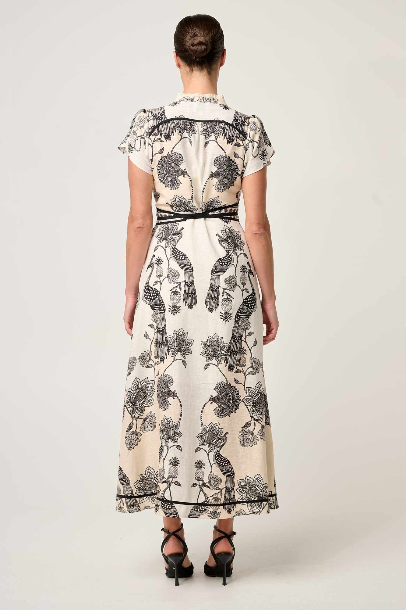 maxi dress cream with black linework worn by model back view