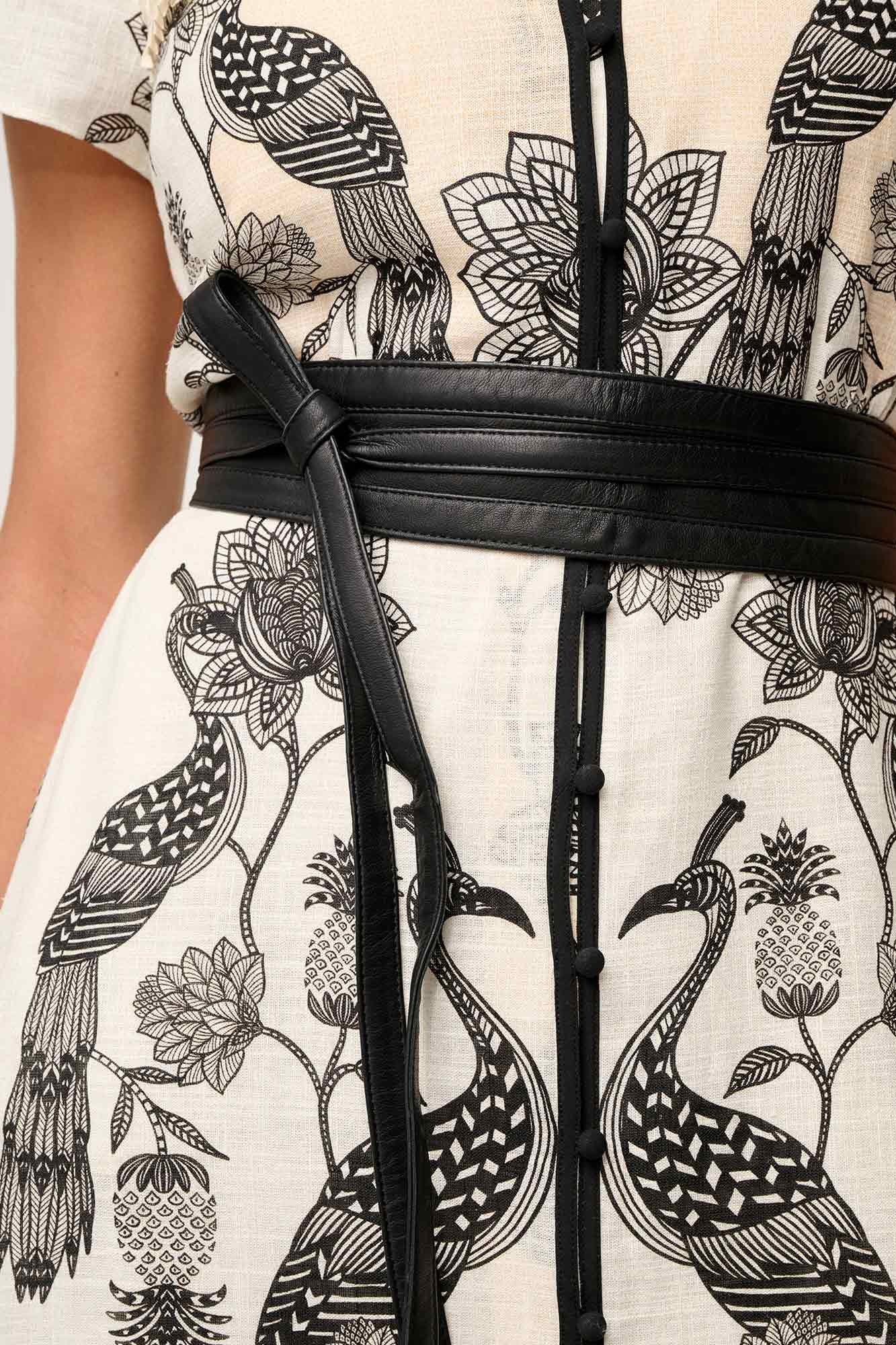 maxi dress cream with black linework worn by model close up