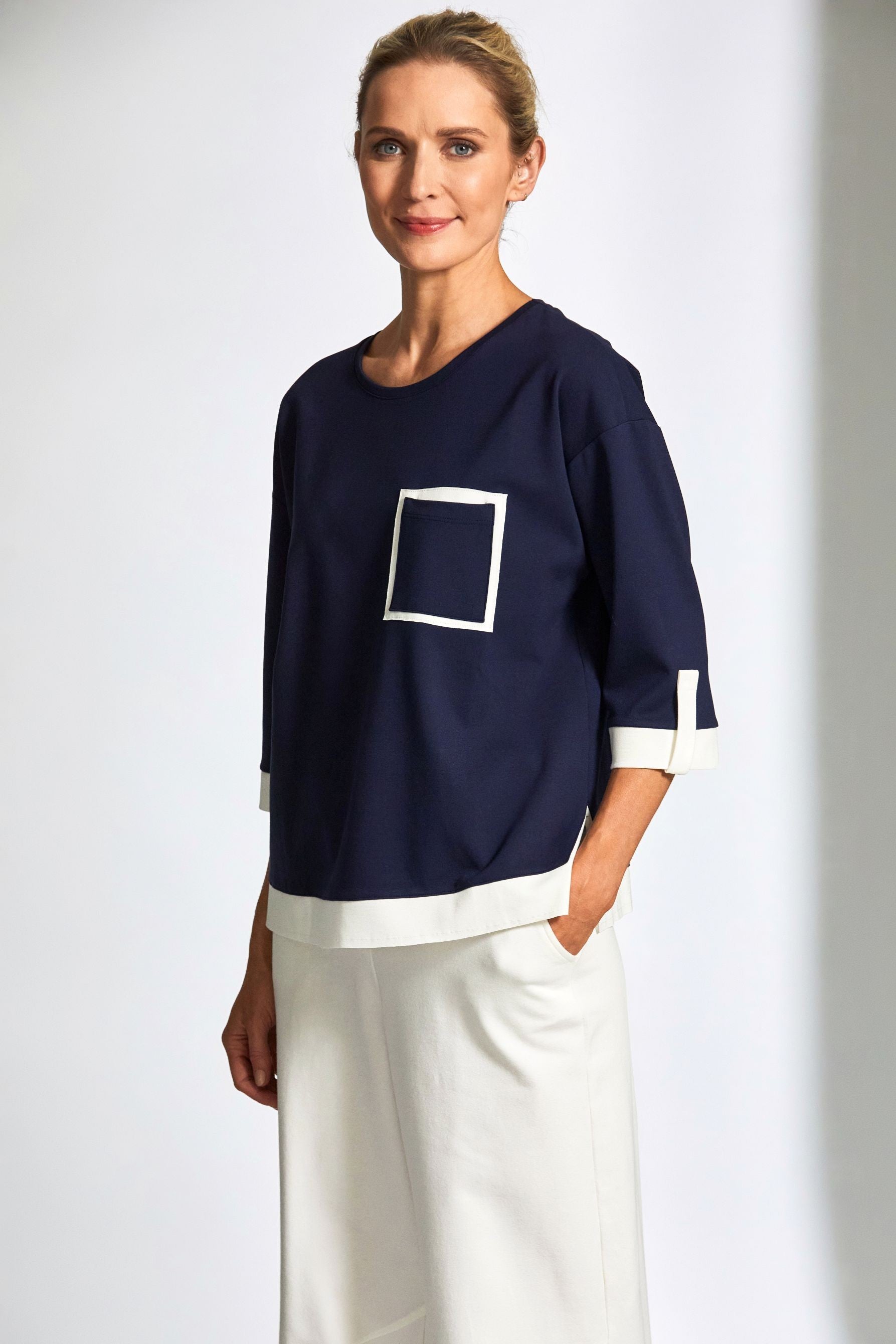 womens top in navy with ecru contrast details worn by model