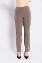 Brown pants worn by a person on a white background