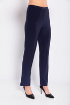 Navy blue pants worn by a person on a white background