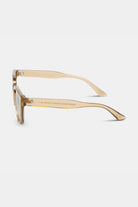 Gold-framed eyeglasses on a white background