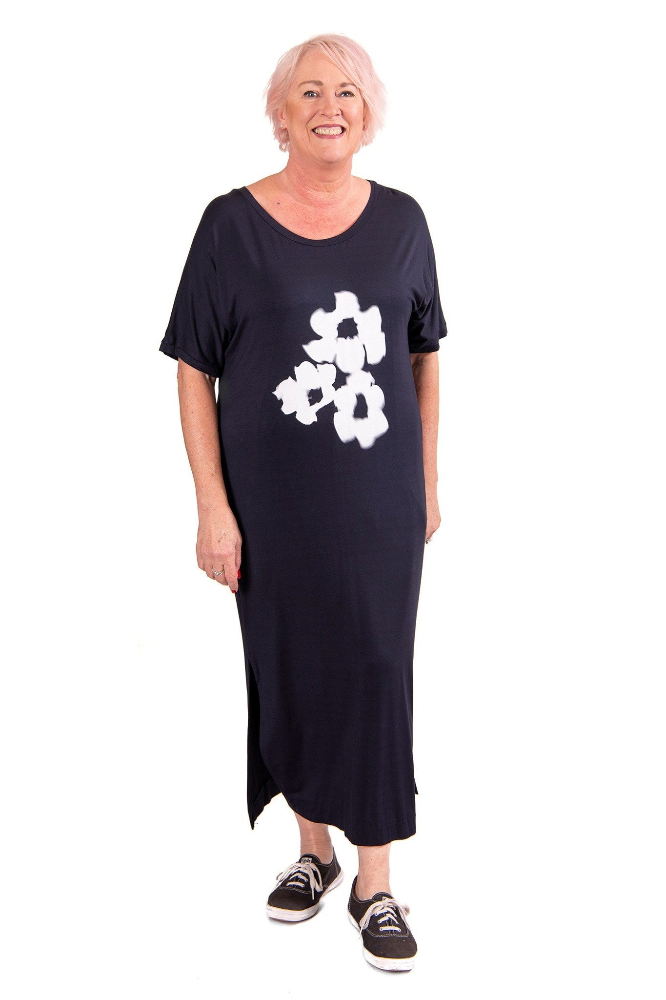 black t shirt dress with white floral print worn by model 