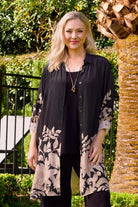 womens longline black with taupe floral shirt worn by model