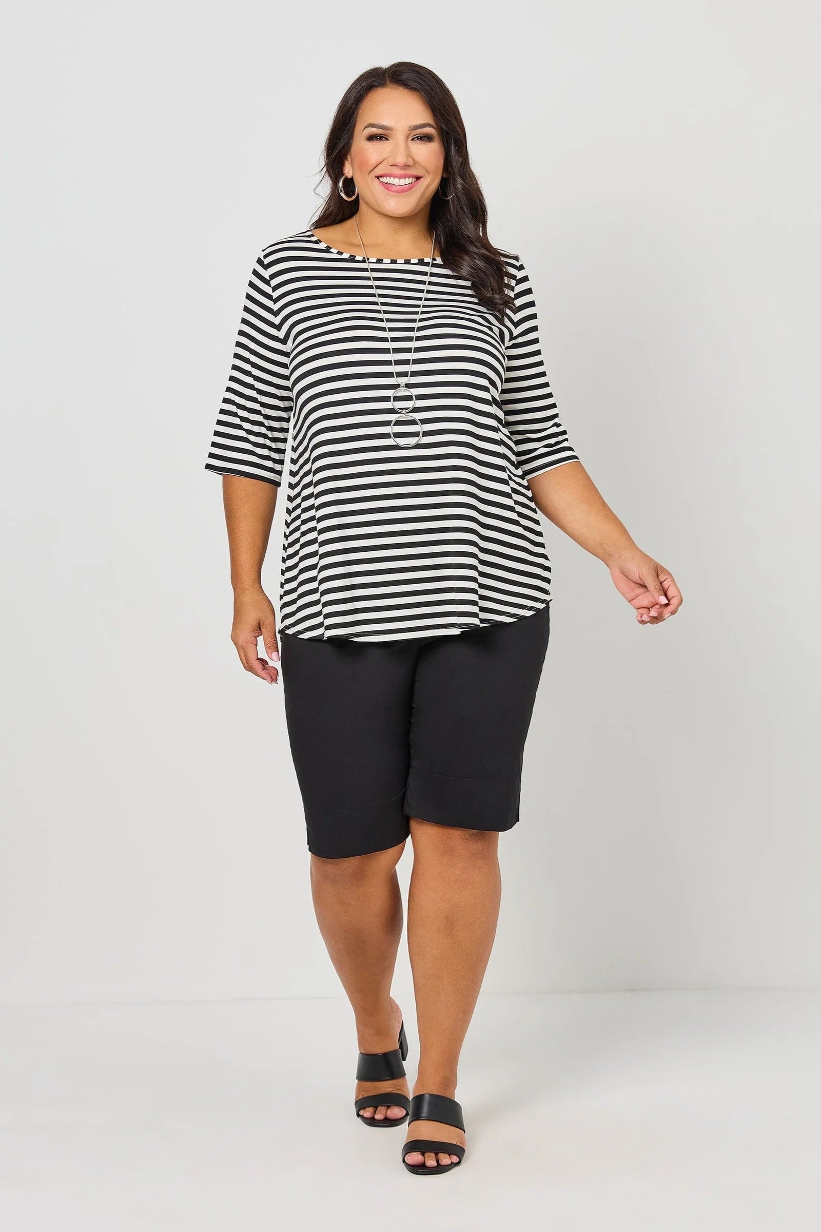 womens half sleeve black white stripe tee worn by model