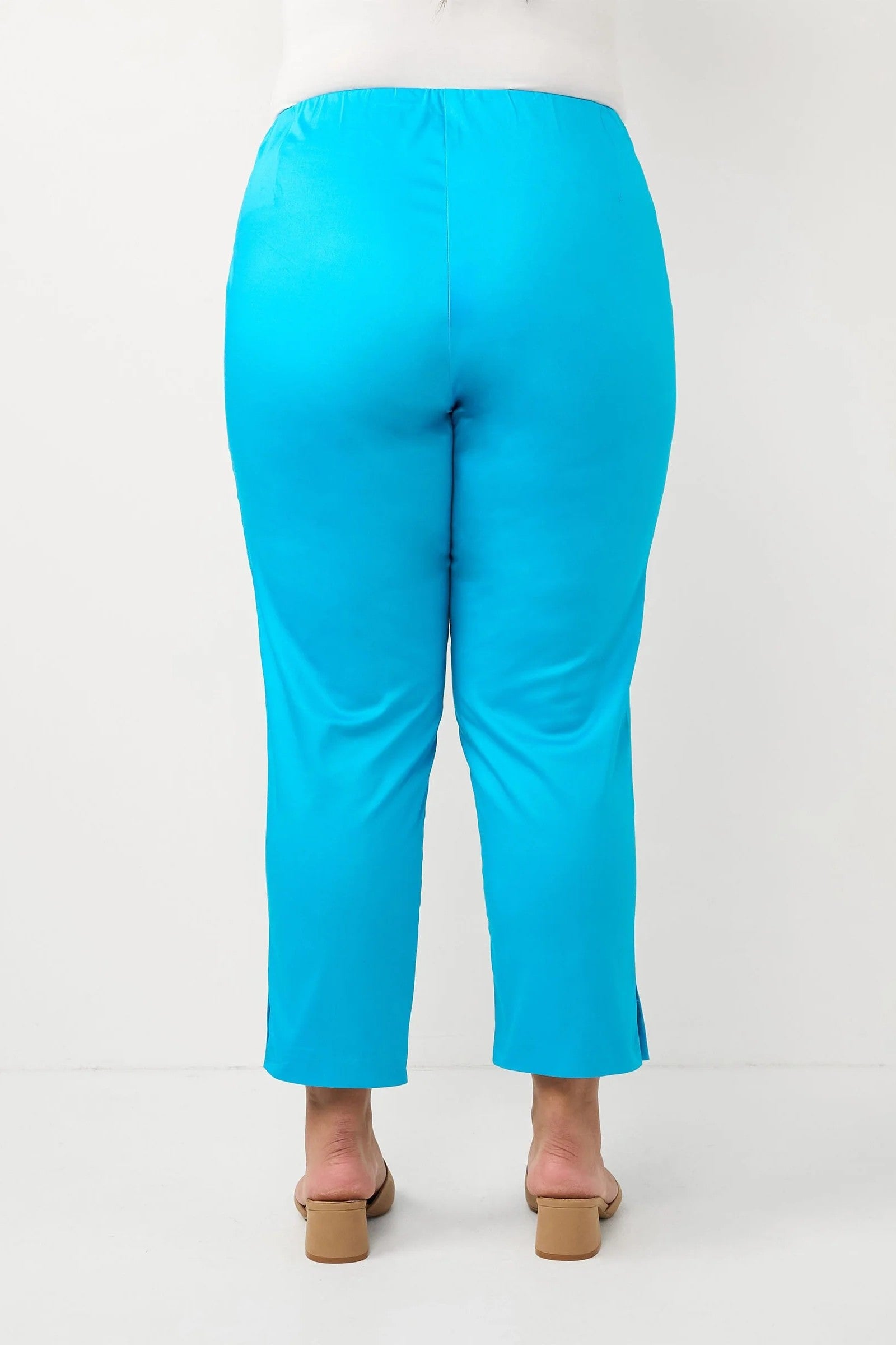 womens turquoise crop slim pants worn by model back view