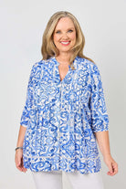womens shirt blouse with blue white mediterranean print worn by model