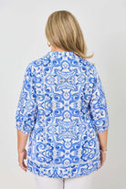 womens shirt blouse with blue white mediterranean print worn by model back view