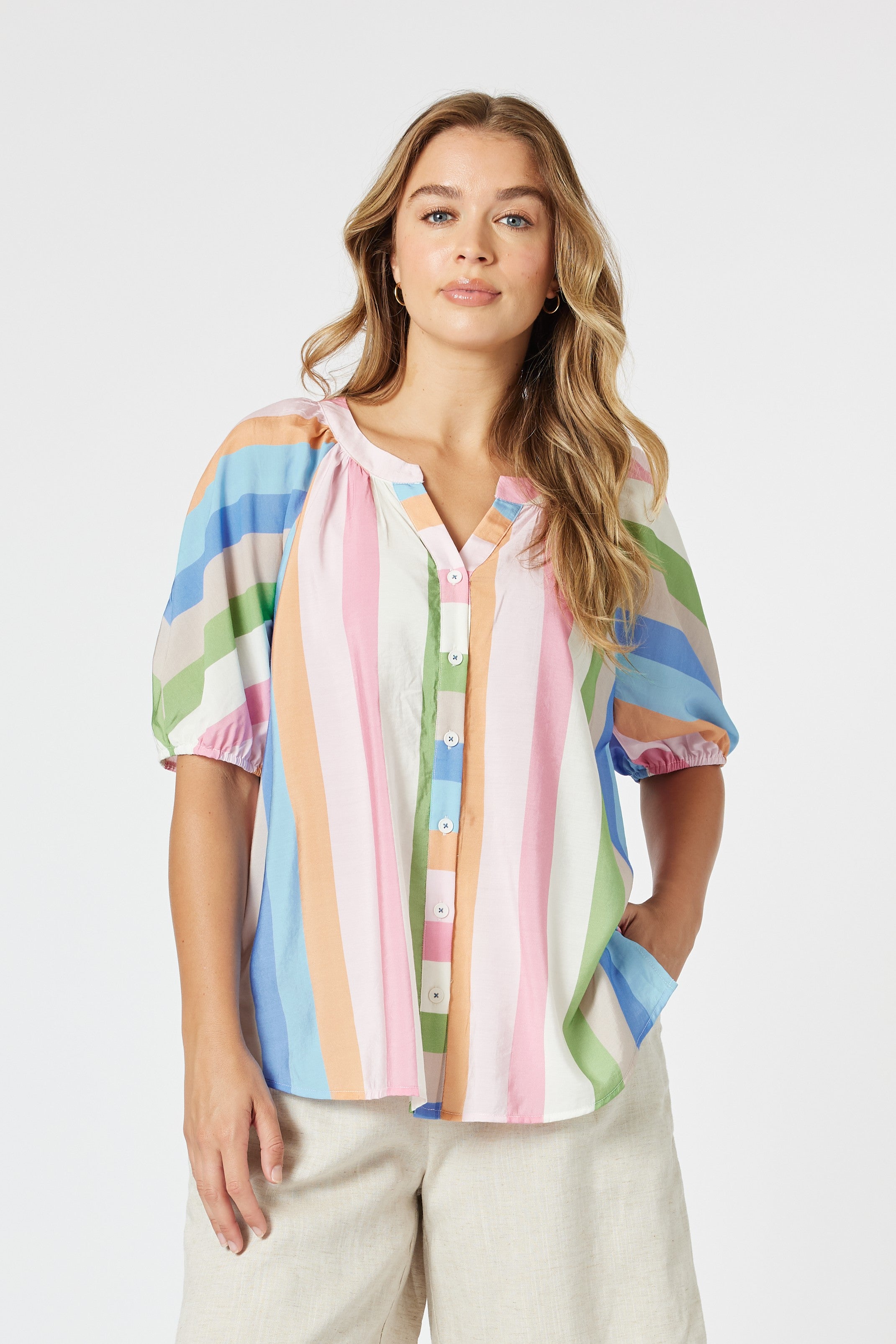 pastel multi colour stripe top worn by model 