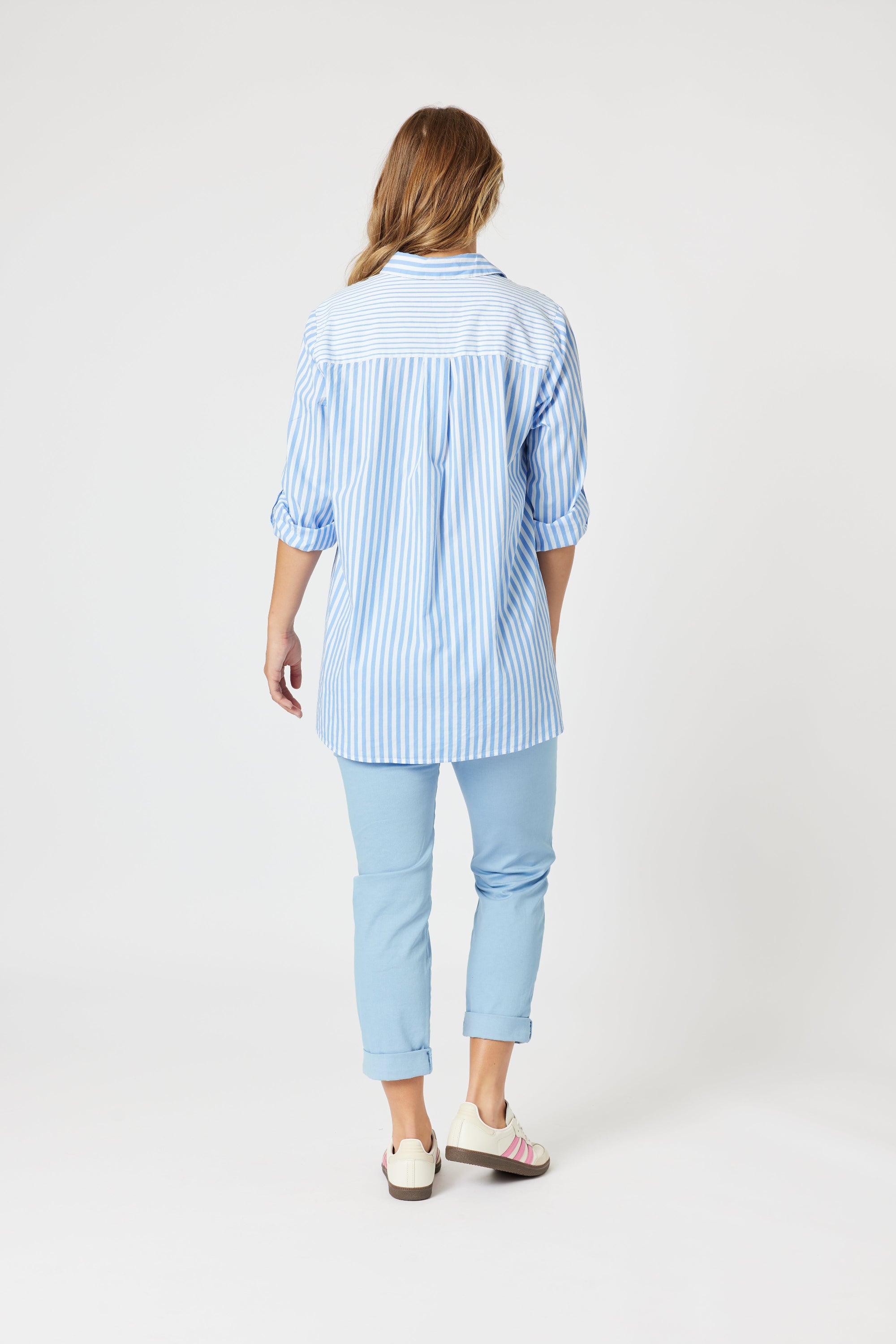 stripe button through shirt light blue and white with long adjustable sleeve worn by model back view