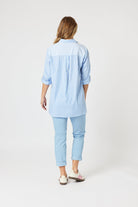 stripe button through shirt light blue and white with long adjustable sleeve worn by model back view