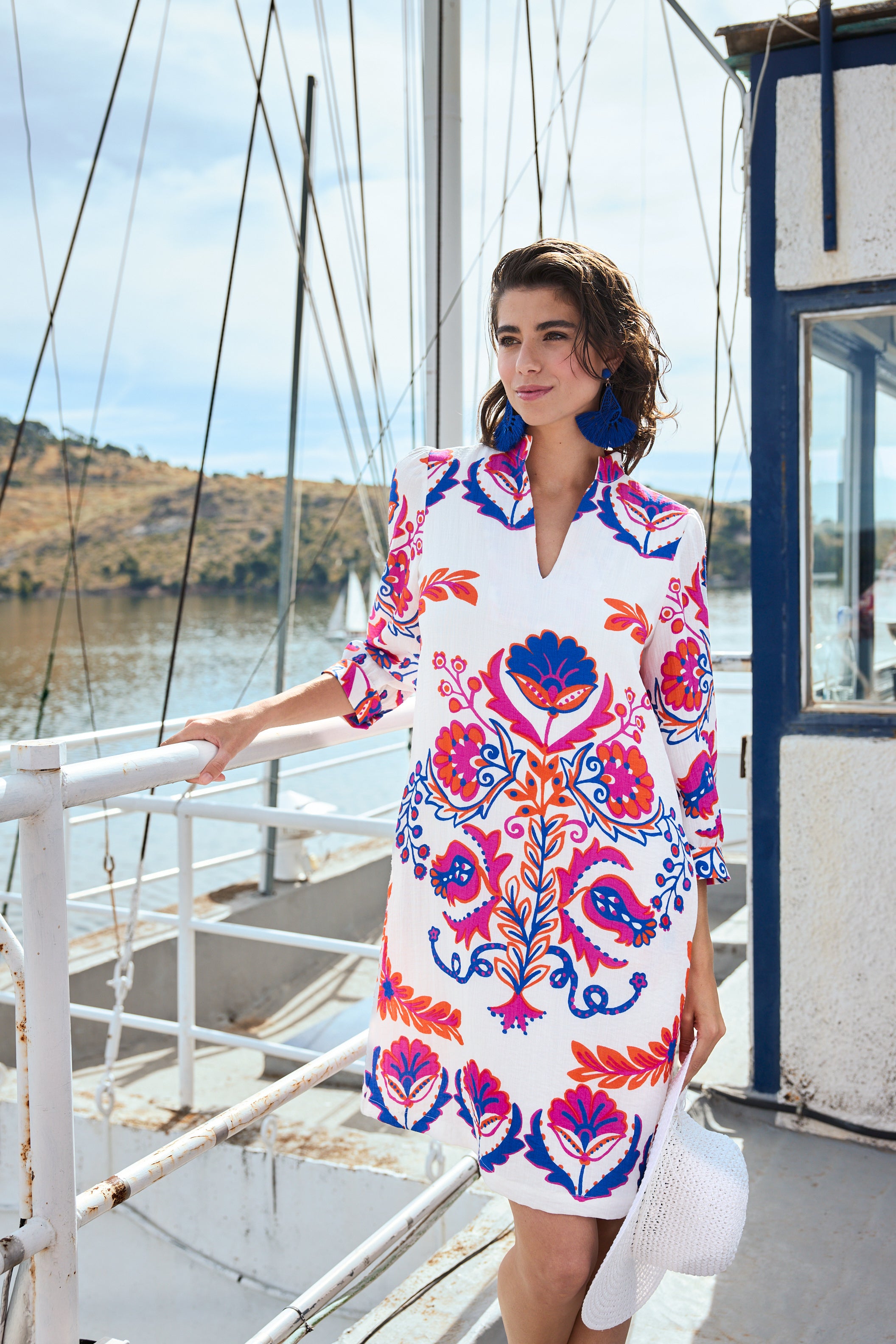 white with pink and blue print shift midi dress worn by model boat campaign