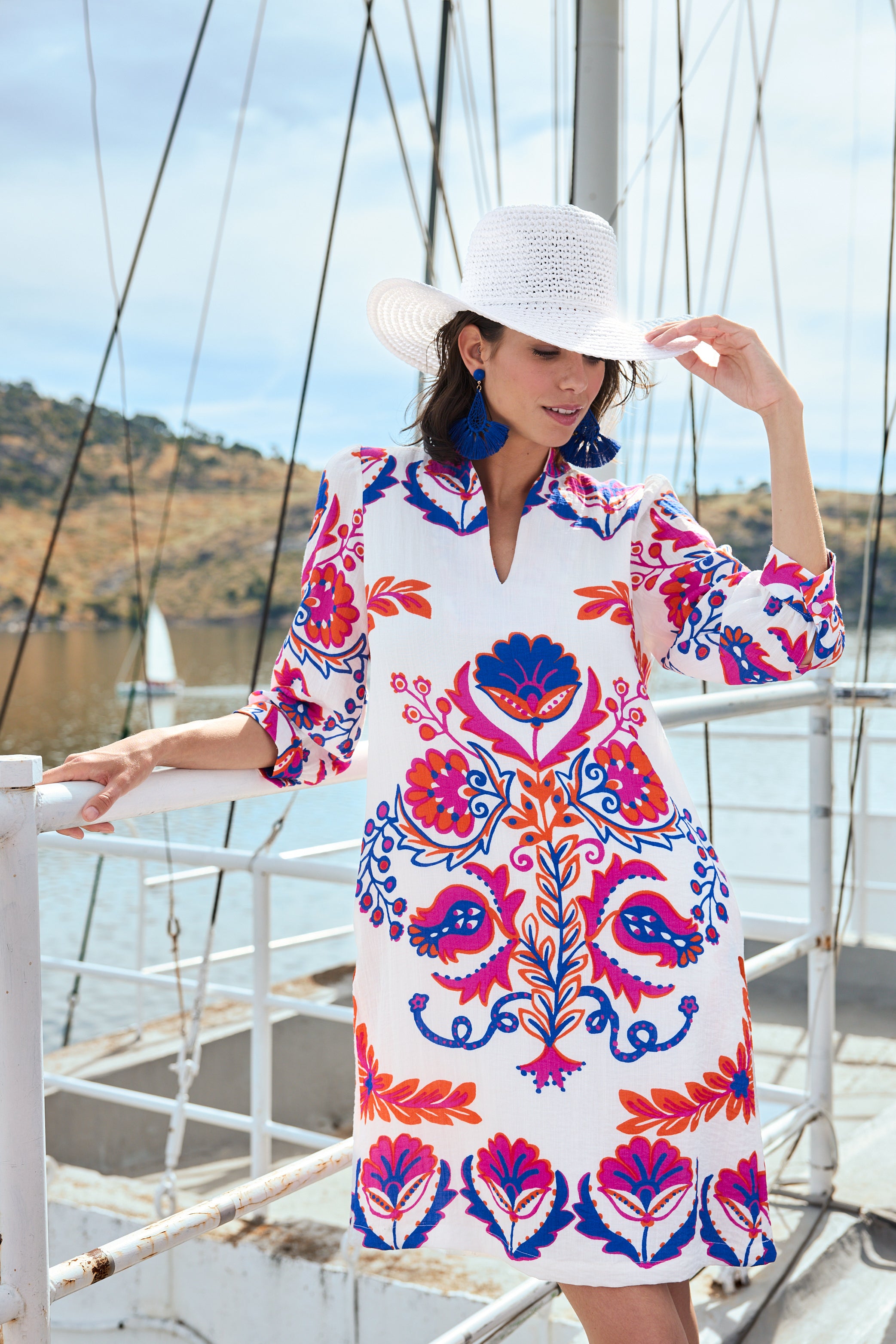 white with pink and blue print shift midi dress worn by model boat campaign