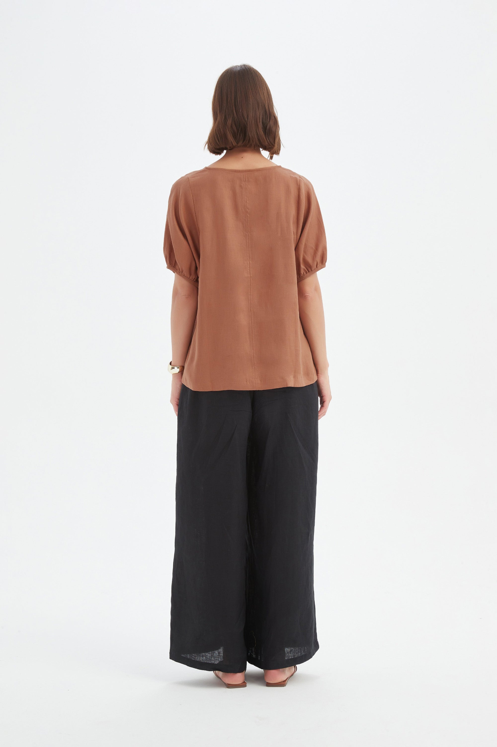 bishop sleeve v neck top in brown cedar worn by model back view
