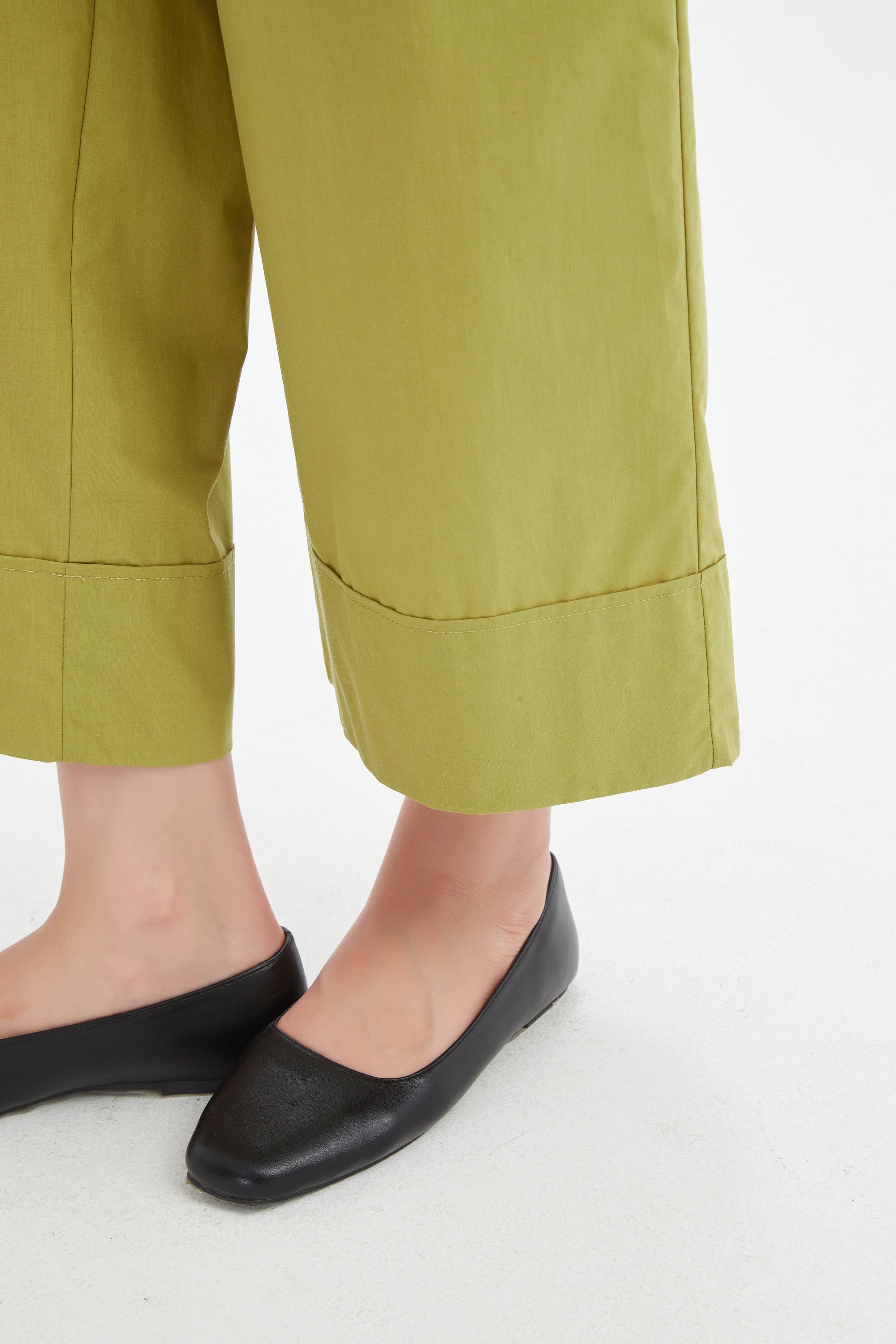 pea green wide leg pant worn by model detail