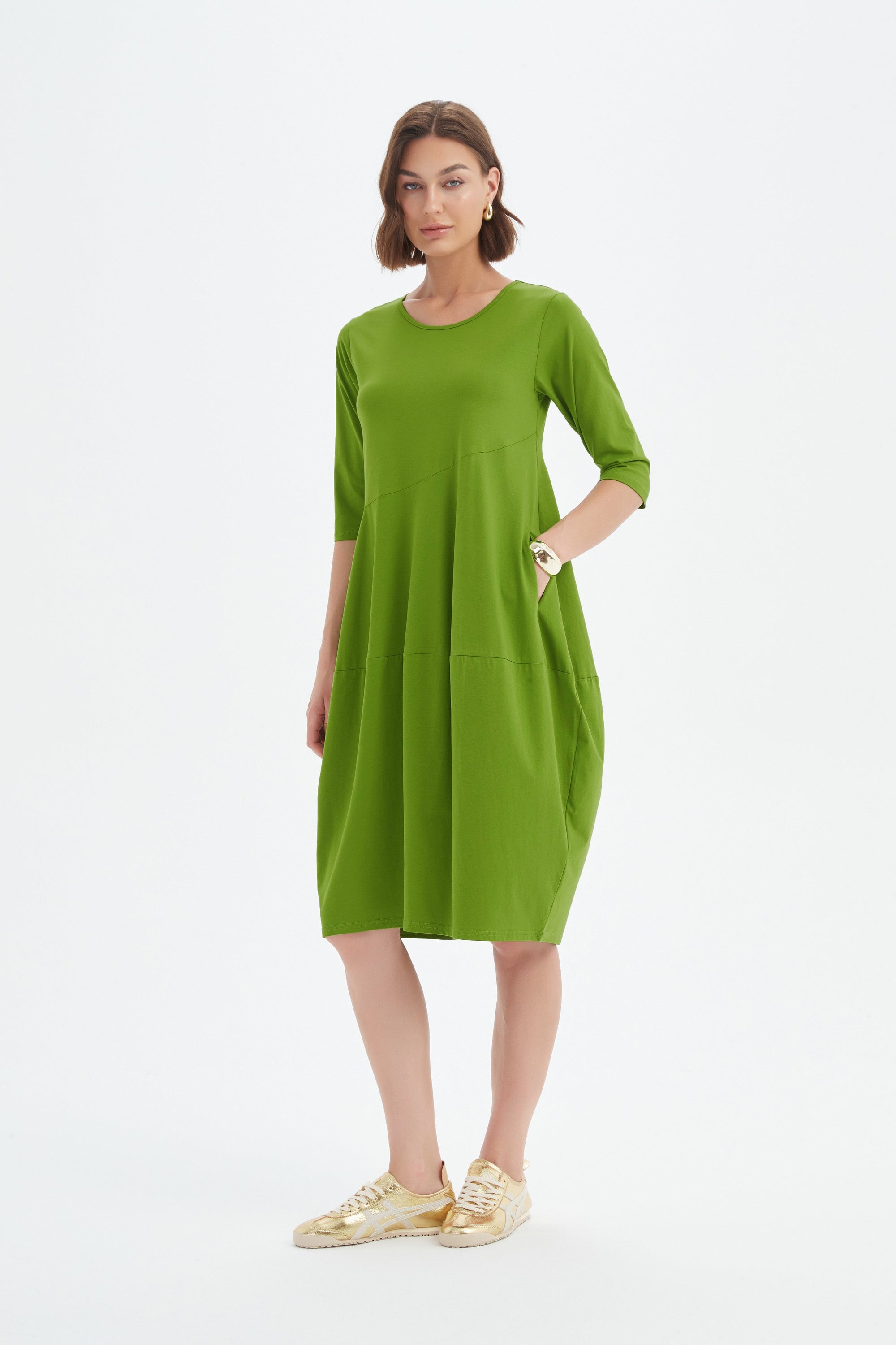 midi diagonal seam dress in green worn by model