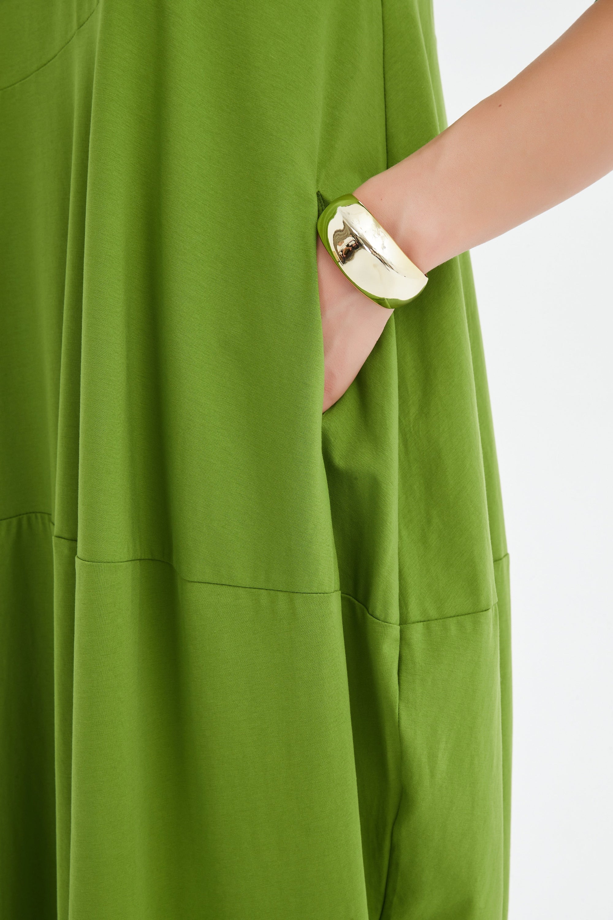 midi diagonal seam dress in green worn by model