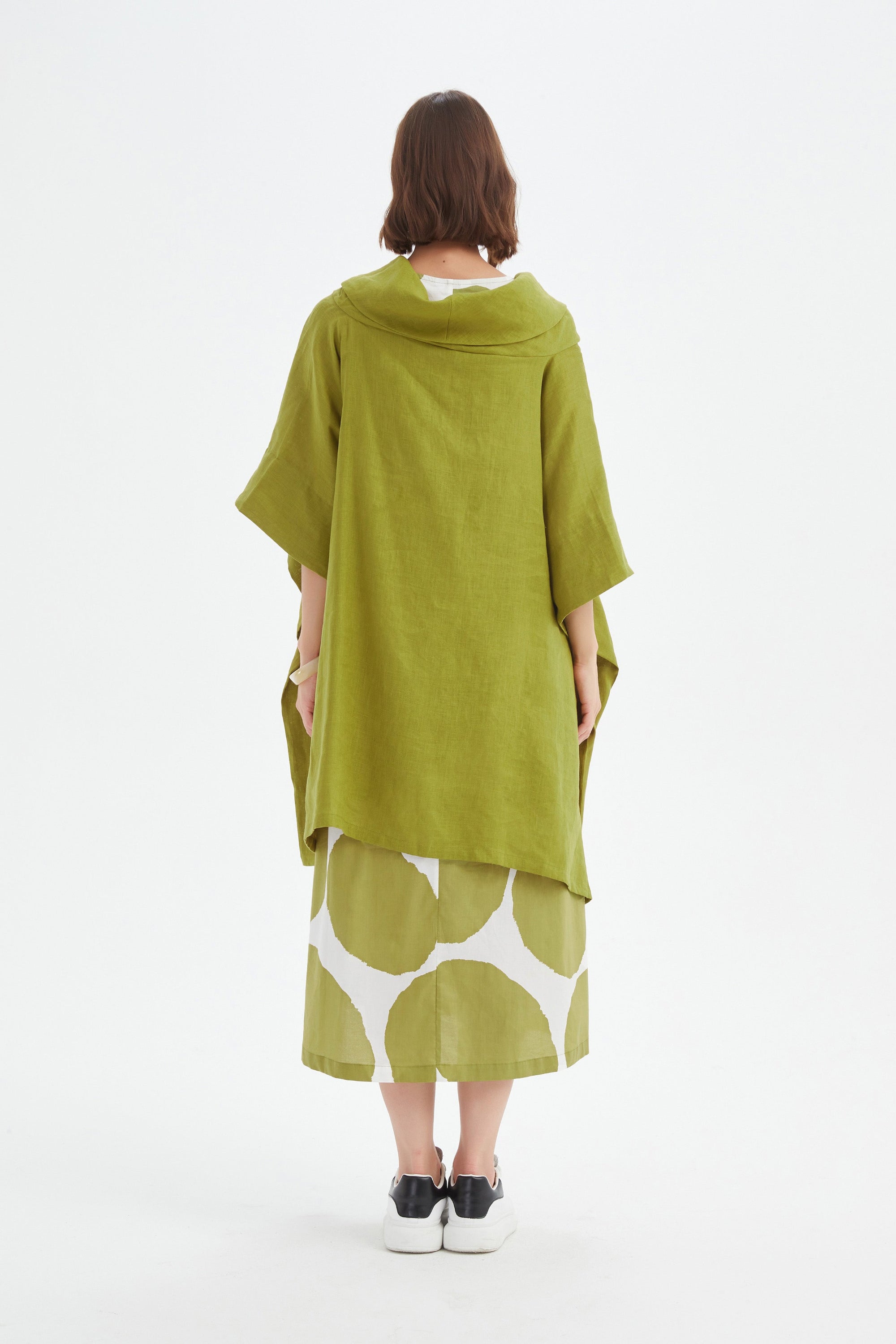 flowy waterfall poncho in chartreuse worn by model back view