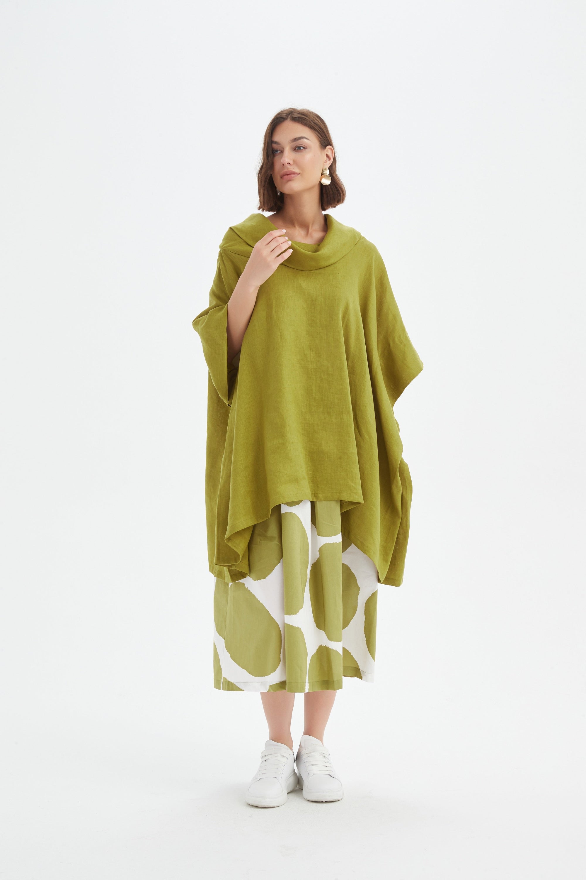 flowy waterfall poncho in chartreuse worn by model 