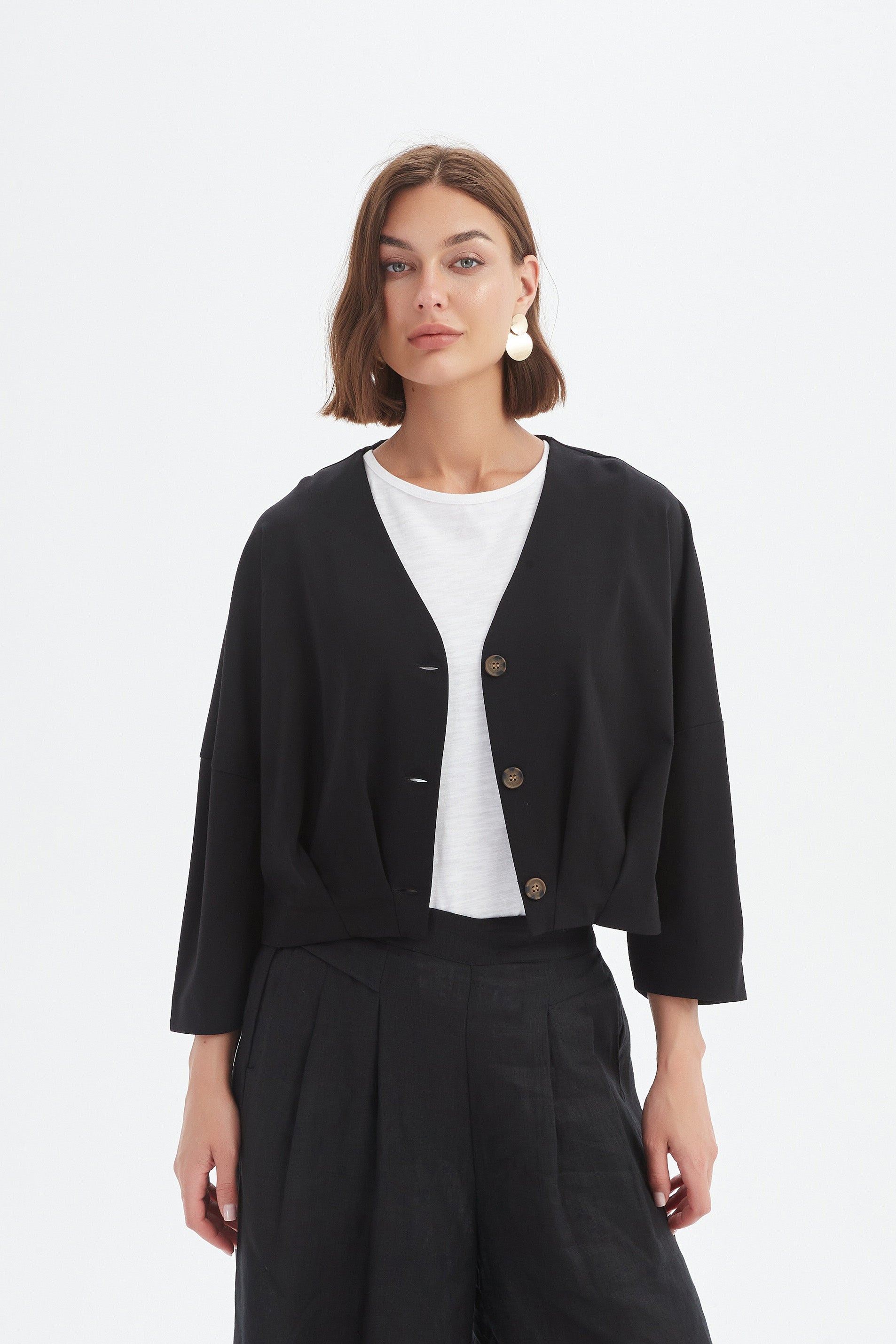 structured cardigan in black worn by model