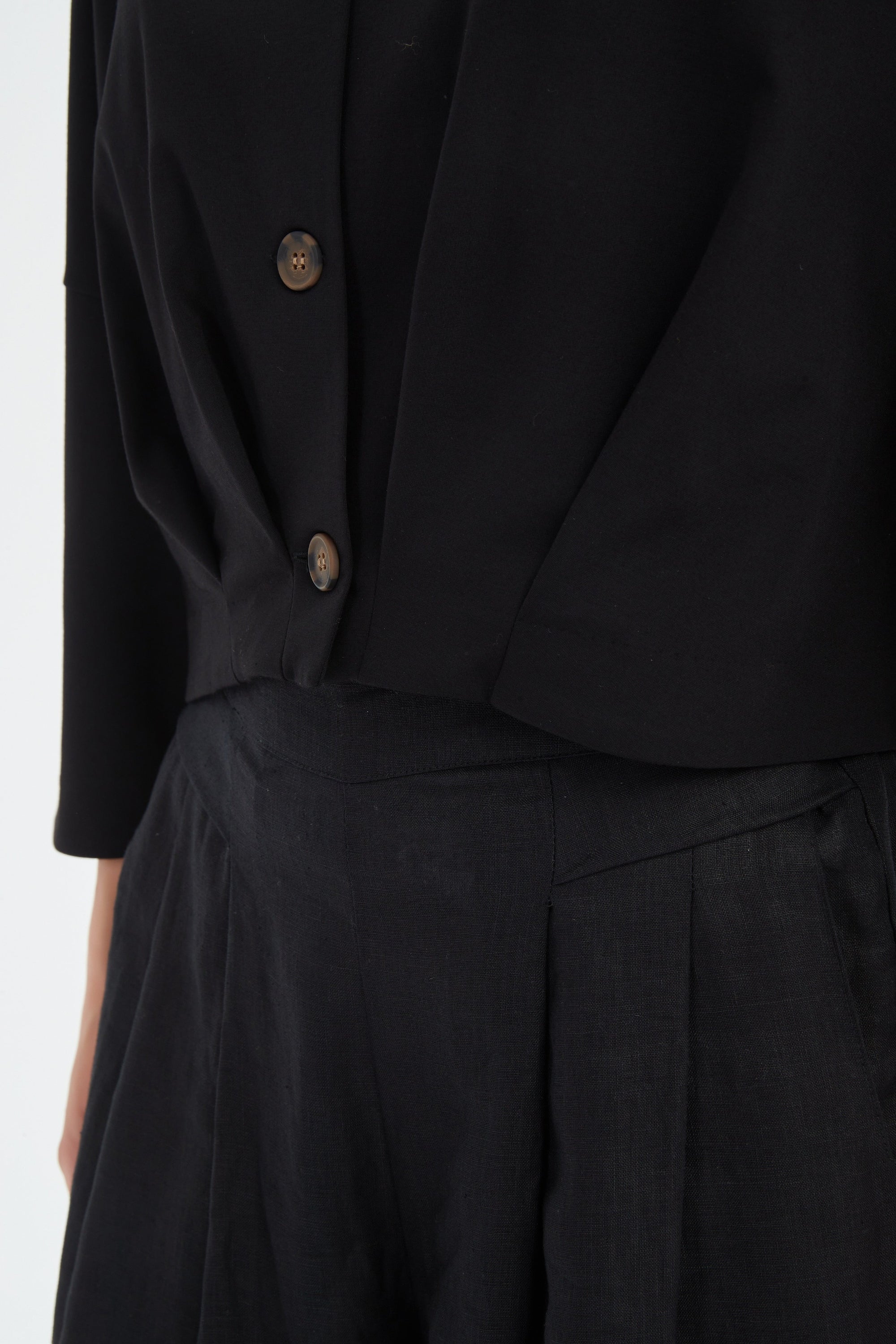 structured cardigan and pant in black worn by model detail