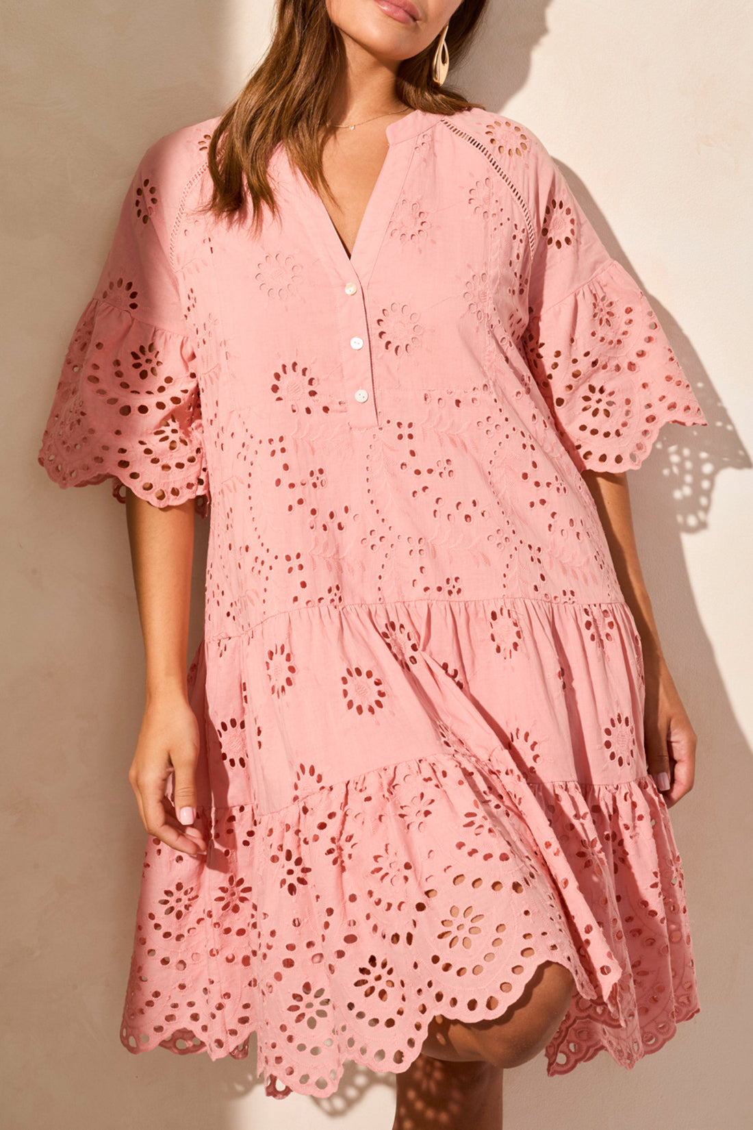 broderie anglaise midi dress in pink worn by model