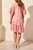broderie anglaise midi dress in pink worn by model back view