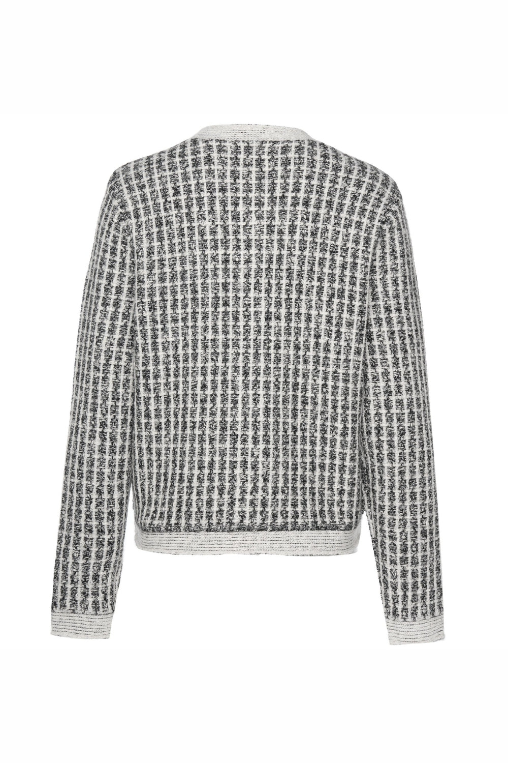 Black and white patterned sweater on a white background back angle