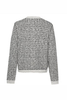 Black and white patterned sweater on a white background back angle