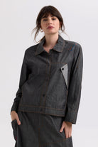 charcoal denim shaket worn by model on a white background